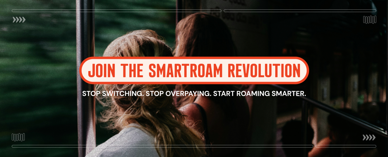 Two people looking out a train window